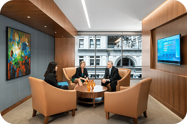 People conversing in a modern office