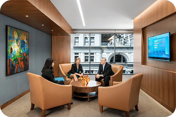 People conversing in a modern office