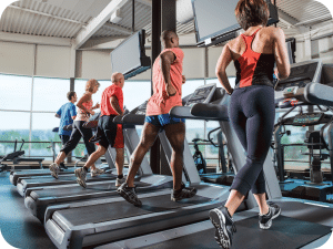 people using treadmills in a gym